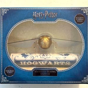Harry Potter Mystery Flying Snitch NIB